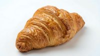 Freshly baked croissant with golden, flaky layers isolated on white background, ready for bakery, food, and culinary design projects.