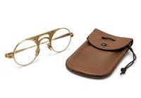 Vintage round eyeglasses with tan frames and brown leather carrying case with drawstring closure, isolated on white background for design and retail use.