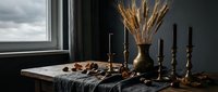 Rustic autumn table setting with wheat bundle in brass vase, vintage candlesticks, nuts and seasonal decor by window creating cozy fall atmosphere.