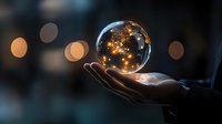 Glowing crystal ball floating over palm reveals magical constellation pattern against dark background with bokeh lights creating mystical atmosphere.