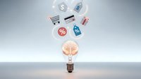 Creative lightbulb with brain inside surrounded by floating commerce icons including shopping cart, credit card, gift box and percentage symbols on clean background.