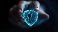Glowing blue heart-shaped digital lock with keyhole floating between hands against dark background, representing cybersecurity and data protection concept.