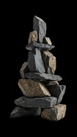 Stacked stone cairn with balanced dark gray and tan rocks isolated on transparent background, ready for design projects, t-shirt graphics, clipart, stickers, and print-on-demand products.