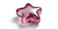 Pink glass star-shaped bowl or decorative dish isolated on white background for home decor, table setting, or gift presentation purposes.