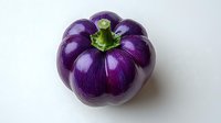 Fresh purple eggplant with green stem on white background, organic vegetable isolated for food photography and culinary design projects.