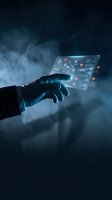 Hand holding transparent digital tablet with glowing network connections and data visualization interface for technology, innovation, and digital transformation concepts.