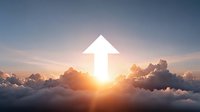White arrow pointing upward above fluffy clouds at sunset with golden sunlight breaking through dramatic sky representing growth and success.