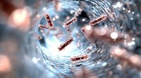 Microscopic bacteria floating in liquid with blurred bokeh background, scientific research concept showing microorganisms in water environment. Medical study.