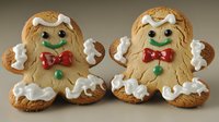 Festive gingerbread couple with red bow ties and white frosting decorations, homemade holiday cookies showing sweet personality and traditional baking charm.
