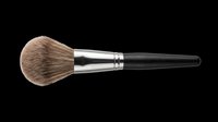 Makeup powder brush with soft bristles and black handle, isolated on transparent background. Ready for beauty clipart, stickers, t-shirt design, and print on demand use.