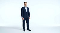 Professional businessman in navy blue suit standing confidently on white background, isolated for business presentations and corporate design projects.