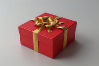 Elegant red gift box with luxurious golden ribbon and decorative bow on neutral background, perfect for holiday marketing, special occasions, and premium product presentations.