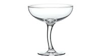 Elegant empty champagne coupe glass isolated on white background, ready for cocktail and beverage design use.