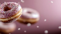Pink frosted donut with colorful sprinkles floating in dreamy pink atmosphere with bokeh effect, close-up view of sweet pastry dessert against blurred background.