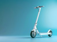 Modern white electric scooter on turquoise background with copy space. Urban mobility and eco-friendly transportation concept for active lifestyle.