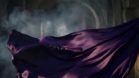 Flowing purple silk fabric in dramatic motion against moody atmospheric background with soft lighting and ethereal smoke effects for luxury design projects.