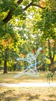Glowing figure practicing yoga meditation in peaceful park setting with decorative hearts and swirls creating magical wellness atmosphere for mindfulness content.