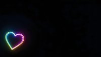 Glowing neon heart with rainbow gradient colors on black background for romantic designs and love-themed projects.