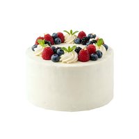 Cream frosted cake topped with fresh raspberries, blueberries, and blackberries with mint leaves on white background, isolated for bakery and dessert design use.