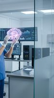 Medical professional examining holographic brain model in modern laboratory with advanced computer systems for neurological research and diagnosis.