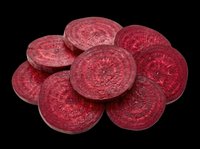 Fresh sliced beetroot rounds isolated on transparent background, ready for food packaging, stickers, print on demand, T-shirt design, and digital clipart use.