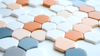 Hexagonal pills in pastel colors of white, peach, and blue arranged in geometric pattern on light surface, pharmaceutical or medical concept background.