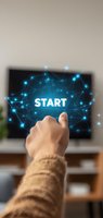 Caucasian hand pointing at glowing START text on screen with connected network nodes, wearing beige sweater. Digital transformation concept for business presentations.