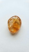 Polished amber gemstone with warm golden-brown tones, isolated on white background. Raw mineral specimen suitable for jewelry design, educational materials, and luxury product presentations.