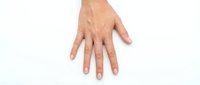 Adult male hand with fair skin tone displayed open palm down against white background, isolated for design use on websites, apps, healthcare materials, and commercial projects.
