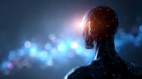 Silhouette of person with glowing mind energy against dark background with blue bokeh lights, representing consciousness, spirituality and mental power.