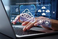 Business professional accessing cloud computing technology interface with security icons and data analytics on laptop screen for digital transformation.
