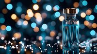 Medical vial and syringe on dark background with blue and orange bokeh lights creating atmospheric healthcare composition. Suitable for vaccination campaigns.