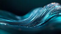Luminous turquoise wave pattern with glowing particles and smooth flowing curves against dark background creates mesmerizing abstract composition for luxury designs.