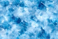 Abstract watercolor background in shades of blue and white with textured marble effect creates dreamy atmospheric pattern for creative design projects.
