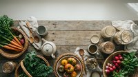 Healthy organic farm fresh vegetables grains and natural ingredients arranged on rustic wooden table for cooking nutritious meals and clean eating lifestyle.