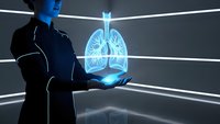Medical professional examining holographic lung anatomy in futuristic healthcare technology environment for respiratory system analysis.