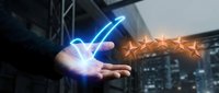 Businessman hand holding glowing blue checkmark with five golden stars rating system for customer satisfaction and quality service evaluation.
