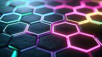 Futuristic hexagonal grid pattern with vibrant neon lighting effects in cyan, magenta and yellow colors creating modern technological background.