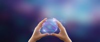 Hands protecting glowing holographic sphere with rainbow colors against purple blue gradient background for technology and innovation concepts.