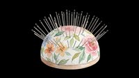 Pincushion with colorful floral pattern and metal pins isolated on transparent background, ready for clipart, t-shirt design, stickers, print-on-demand products, and sublimation crafts.
