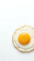 Fried egg with golden yolk isolated on white background for breakfast menu design and culinary projects.