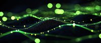 Glowing green particles and light waves flow on dark background creating futuristic network visualization effect for technology and science concepts.