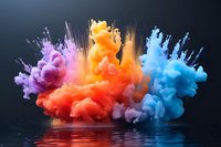 Vibrant multicolored ink drops in water creating dynamic cloud formations with purple, orange, red and blue hues against dark background with reflection on surface.
