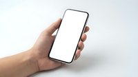 Hand holding modern smartphone with blank white screen mockup isolated on white background for app presentation and mobile interface design.