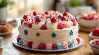 Festive celebration cake with white frosting, colorful swirled rosettes, star decorations and berry toppings on kitchen counter for party dessert.