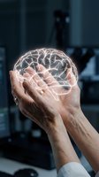 Hands holding glowing digital brain hologram representing artificial intelligence, neuroscience research, mental health awareness and cognitive technology innovation.