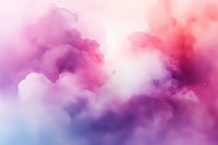 Dreamy pink and purple clouds with soft blue undertones create ethereal atmosphere, abstract watercolor effect background for creative design projects and wallpapers.
