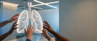 Diverse hands reaching toward glowing lung hologram in modern medical facility representing respiratory health teamwork and collaborative healthcare innovation.