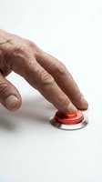 Male hand with light skin tone pressing red button on white background, ready for design use in web, app, and marketing materials.