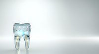 Transparent tooth model with glowing blue light inside, isolated on white background for dental education, healthcare presentations, and dentistry design projects.